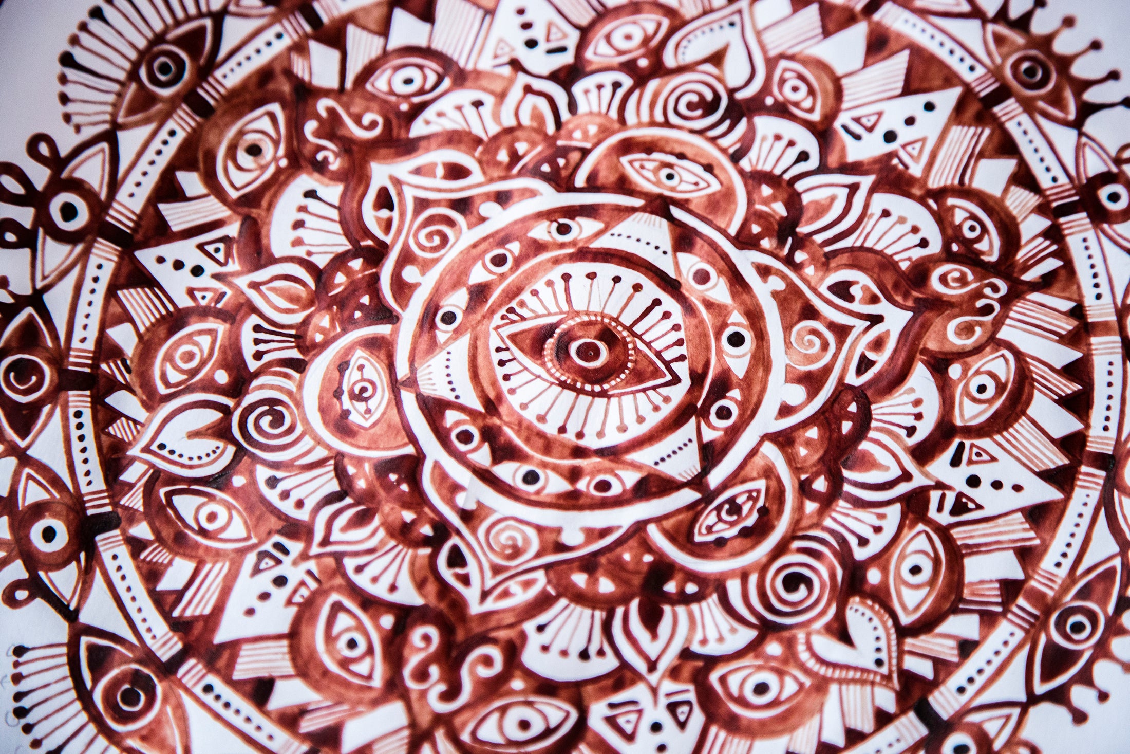  intricate mandala design with brown and white colors
